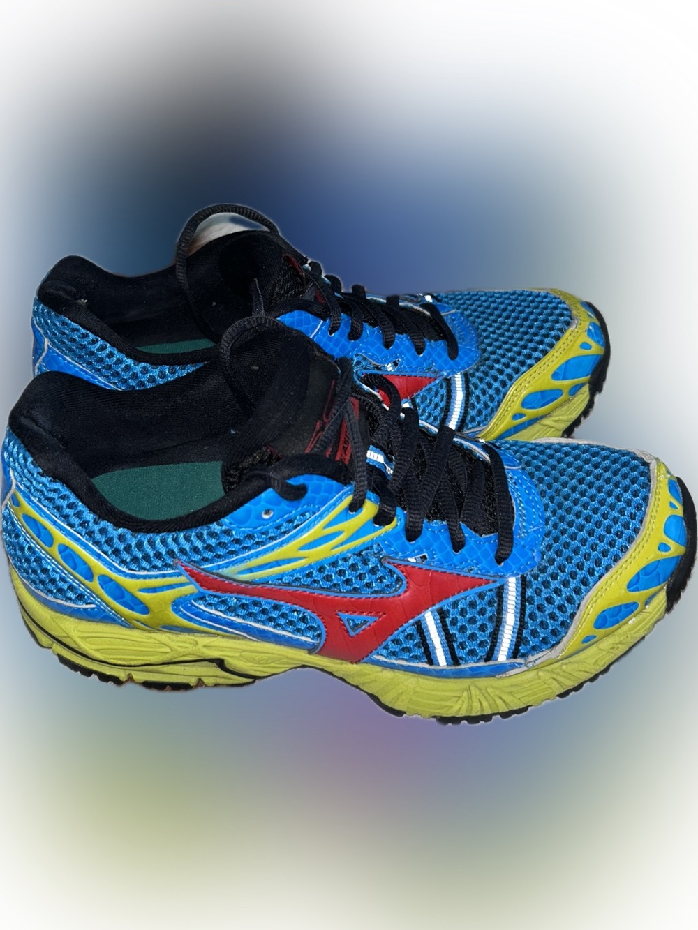 Mizuno Wave Ascend 7 Athletic Running Shoes with Red, Blue, and Yellow Accents